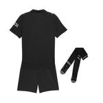 Kit infantil de visitante del Manchester City 25/26