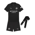 Kit infantil de visitante del Manchester City 25/26