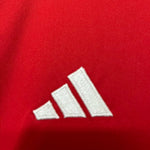 Kit local infantil del Arsenal 24/25